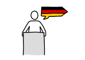 Einfache Zeichnung einer Person an einem Rednerpult, der eine Sprechblase in Pfeilform zugeordnet ist; die Sprechblase ist mit den Farben der Deutschlandflagge gefüllt